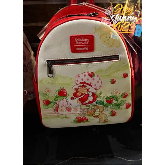 Loungefly Handbags - Loungefly Strawberry Shortcake Gardening Mini Backpack